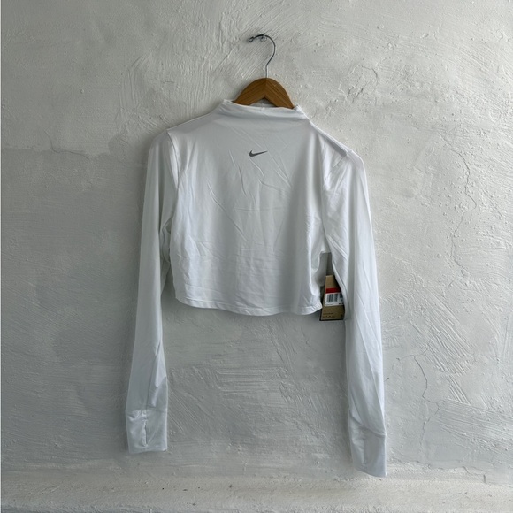 Nike Tops - white Nike Dri-FIT One Luxe
Women's Long-Sleeve Cropped Top